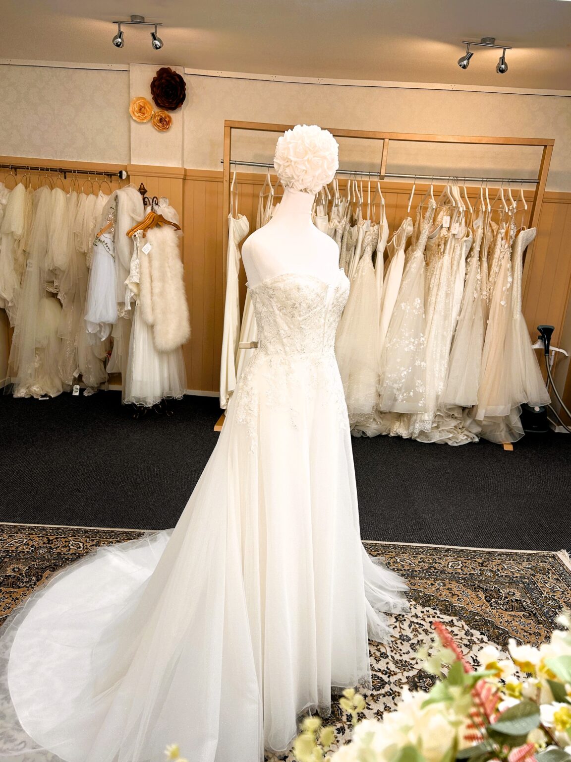 Tania Olsen Lacey fit-and-flare wedding dress side view