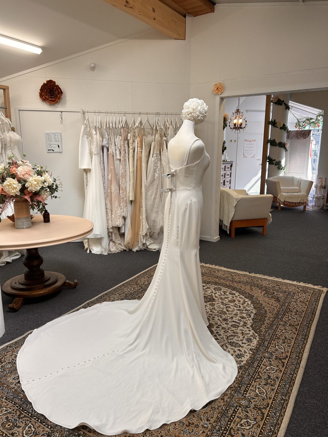Rebecca Ingram Chandra wedding dress back view with buttons and long train