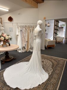 Rebecca Ingram Chandra wedding dress back view with buttons and long train
